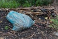 The blue garbage bags made from plastic materials.