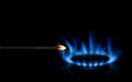 Blue gas flames against dark background Royalty Free Stock Photo