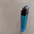 Blue gas lighter that is refillable and easy to carry