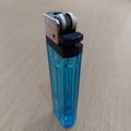 Blue gas lighter that is refillable and easy to carry