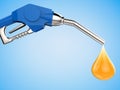 Blue gas pump nozzle with oil drop Royalty Free Stock Photo