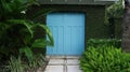Blue gate door to a garden Royalty Free Stock Photo
