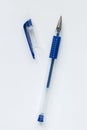 Blue gel pen with open pen cap on white background. Royalty Free Stock Photo