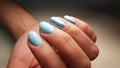 Blue gel polish manicure Royalty Free Stock Photo