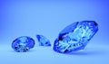 Blue gems or diamonds, bright blue background