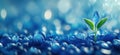Blue gemstone background with green sprout symbolizing growth and renewal Royalty Free Stock Photo