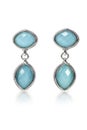 Blue Gemstone and diamond earrings Royalty Free Stock Photo