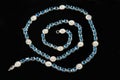 Blue Gemstone and Diamond Pendant Necklace isolated on black Royalty Free Stock Photo