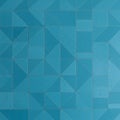Blue geometric pattern made of tiles arranged in a grid. The tiles vary in shape, Royalty Free Stock Photo
