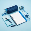 A blue geometric-patterned pencil case holds several blue pencils Royalty Free Stock Photo