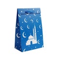 Blue gift bag with white crescent moons and mosque design for eid celebration Royalty Free Stock Photo