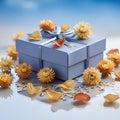 Blue Gift Box with Flowers and Sequins Royalty Free Stock Photo