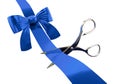 Blue gift ribbon with scissors cutting it Royalty Free Stock Photo