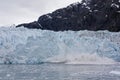 Blue glacier calving Royalty Free Stock Photo