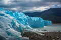 The blue glacier comes out into the water. Shevelev. Royalty Free Stock Photo