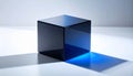 Blue Glass Cube Casting a Luminous Shadow Royalty Free Stock Photo