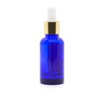 Blue glass dropper serum bottle on white background Royalty Free Stock Photo