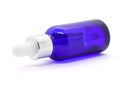 Blue glass dropper serum bottle on white background Royalty Free Stock Photo