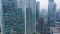 Blue glass modern skyscraper and office building in Jakarta. Glass modern fasade, reflection - Architecture in center