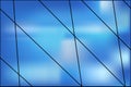 Blue glass office building. Clouds Reflected in Windows of Modern Office Building. Royalty Free Stock Photo