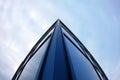 Blue glass office building corner wide angle view modern skyscraper Royalty Free Stock Photo