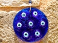 blue glass ornament circle souvenir with eye-shaped amulets - Nazar boncuk
