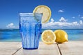 Blue glass with sparkling water and lemon Royalty Free Stock Photo