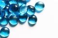 Blue glass spheres on white background. Closeup macro abstract Royalty Free Stock Photo