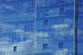 Blue glass texture of windows on the wall Royalty Free Stock Photo