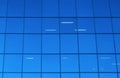 Blue glass windows office skyscraper building background Royalty Free Stock Photo