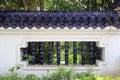 Blue glazed roof tiles on wall