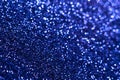 Blue glitter texture. Festive sparkling sequins background closeup. Wpaper for Valentine, New Year or Christmas Holidays