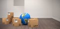 Composite image of blue globe with cardboard boxes Royalty Free Stock Photo
