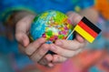 The Blue Globe with the territories of the countries of the World and the flag of Germany, the territory of Germany Royalty Free Stock Photo