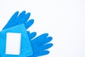 Blue gloves and rag sponge on white background. cleaning set for different surfaces in kitchen, bathroom and other rooms . Royalty Free Stock Photo