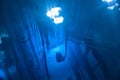 Blue glow water of nuclear reactor core powered, caused by Cherenkov radiation, fuel plates industrial uran. Blurred Royalty Free Stock Photo