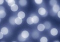 Blue glowing bokeh lights floating abstract background Royalty Free Stock Photo