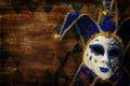 blue with gold elegant traditional venetian mask over dark background. Royalty Free Stock Photo