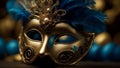 Blue and gold Venetian carnival mask with feathers, copy space