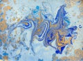 Blue and golden liquid texture, watercolor hand drawn marbling illustration, abstract background Royalty Free Stock Photo