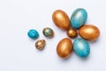 Blue and golden modern easter eggs on a white background. Like the shape of a flower