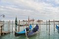 Blue gondolas parked in the Venetian lagoon, the Grand Canal in Venice, Italy Royalty Free Stock Photo