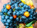Blue grapes and pears in a vase. Fruit Royalty Free Stock Photo