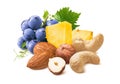 Blue grapes, pineapple, hazelnut, almond and cashew nut mix isolated on white background Royalty Free Stock Photo