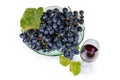 Blue grapes on vintage fruit vase, red wine, top view Royalty Free Stock Photo