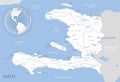 Blue-gray detailed map of Haiti administrative divisions and location on the globe.