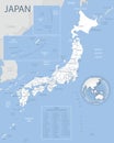 Blue-gray detailed map of Japan with administrative districts and location on the globe.