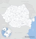 Blue-gray detailed map of Romania administrative divisions and location on the globe