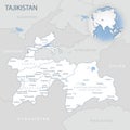 Blue-gray detailed map of Tajikistan administrative divisions and location on the globe