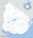 Blue-gray detailed map of Uruguay administrative divisions and location on the globe